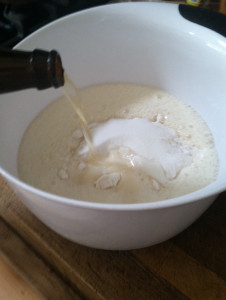 adding the beer to beer bread